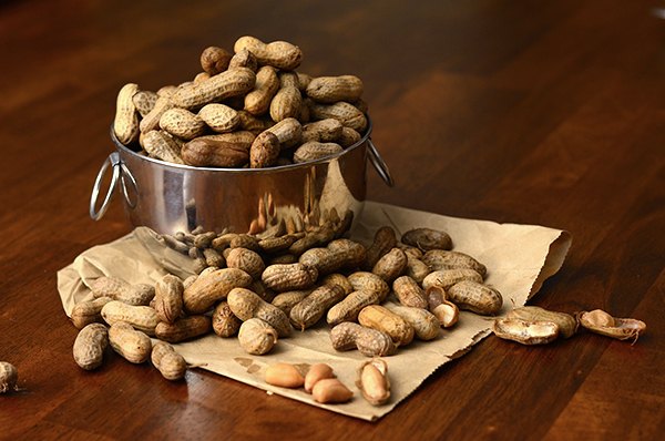 Boiled peanuts in the shell, tipped out of the pot — soft, salty, and nothing whatsoever like a roasted peanut