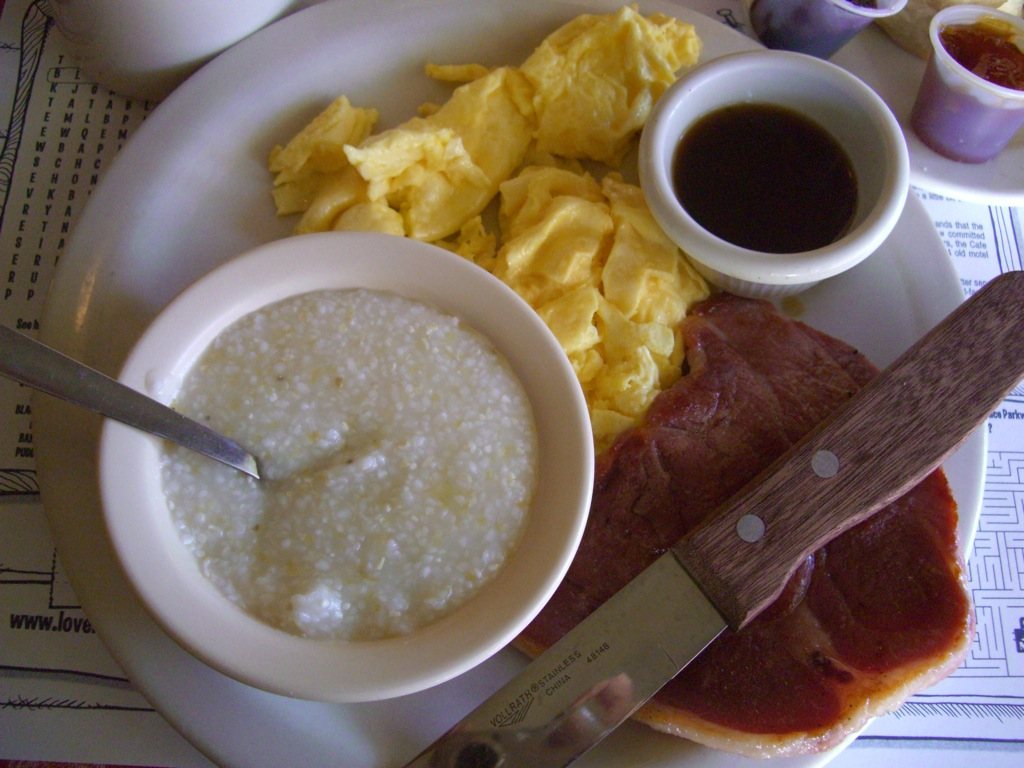 Country ham, grits, eggs, and a little cup of red-eye gravy on the side. No flour, no roux — just coffee, ham fat, and the browned bits off the pan
