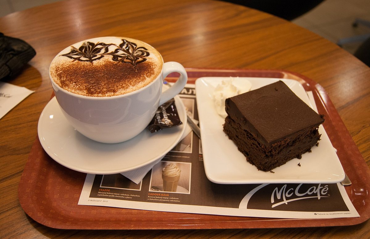 Coffee and chocolate cake, together, which is how most of the world meets this idea without thinking about it