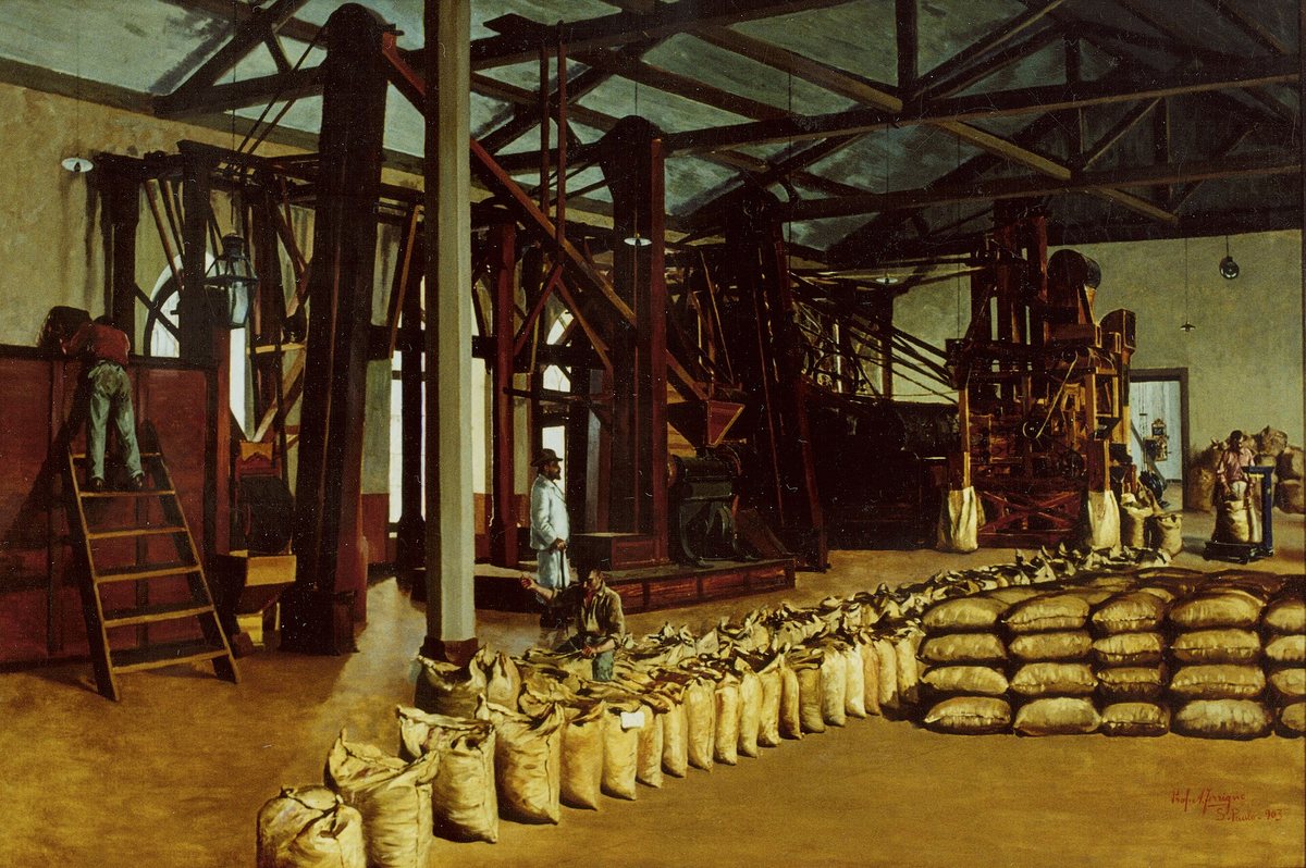 A Brazilian coffee warehouse painted from life — sacks stacked to the roof, and the labour that filled them out of frame. This is the scale that made coffee cheap