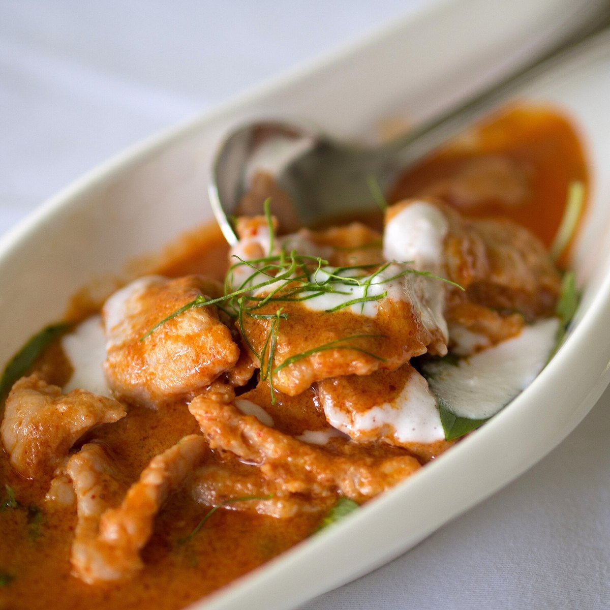 Panang with pork, shredded makrut lime leaf over the top