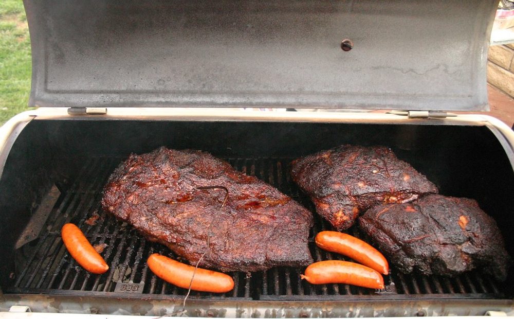 A smoker running pork and brisket (placeholder for my commissary smoker)