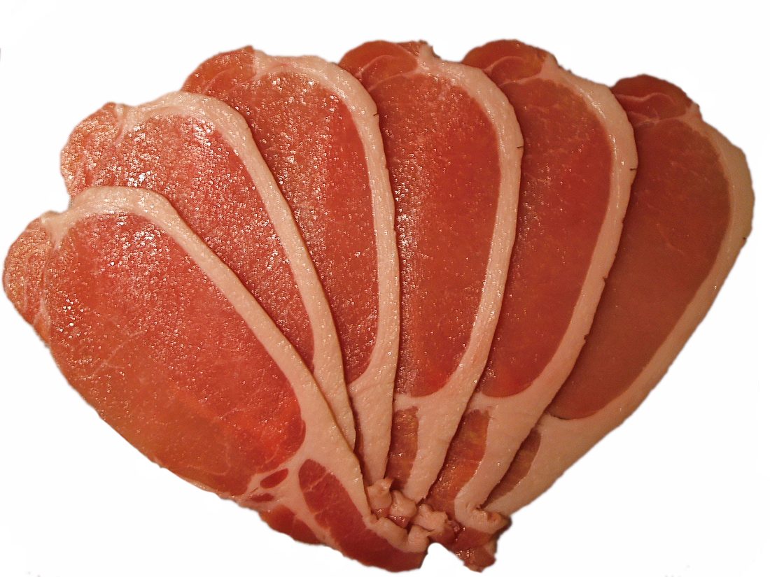 Back bacon rashers, each slice showing the lean round loin eye with a fattier tail of belly attached