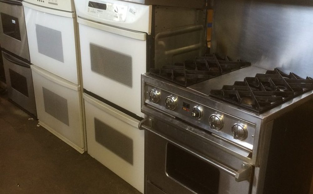 Checking a used commercial convection oven with the doors open (placeholder for my Blodgett)