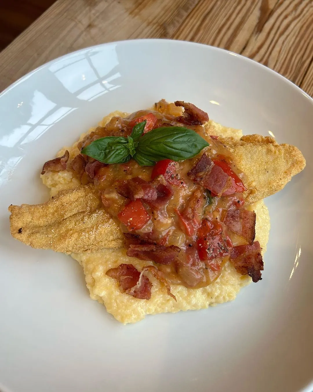 Crispy Fried Catfish over Grits with Bacon-Tomato Gravy