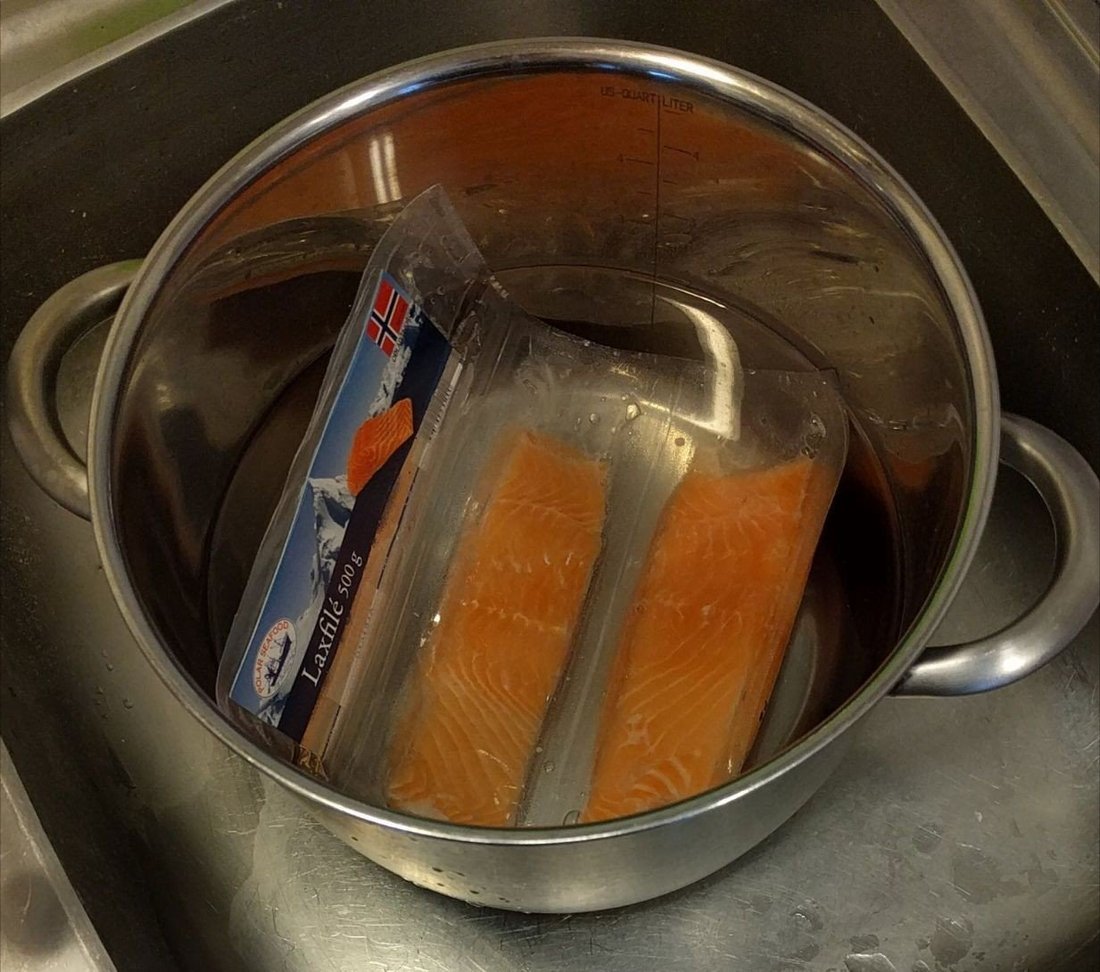Commercially frozen, vacuum-packed salmon. The freezing is the safety step. The vinegar that comes later is not