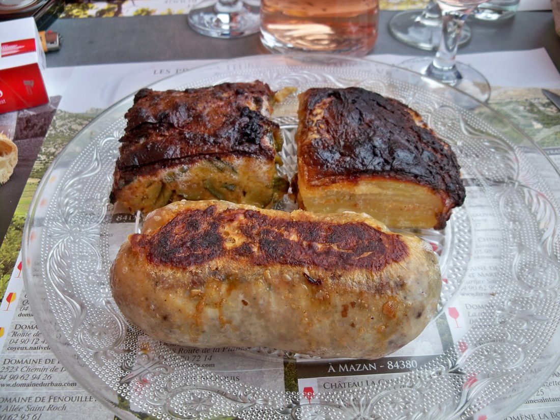 Andouillette, cut to show its coarse chitterling interior — the pungent Troyes sausage that shares only a root word with Cajun andouille.