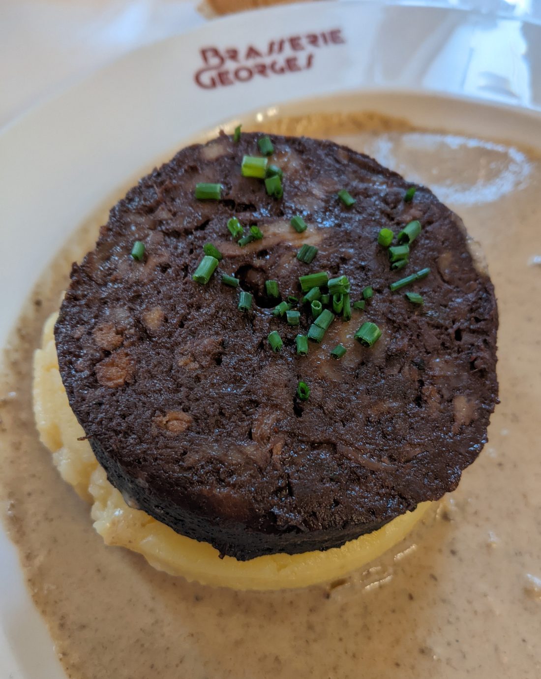 Boudin noir — the French blood sausage, set on blood and fat. Not the Cajun rice boudin that borrowed the name.