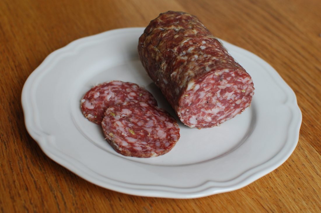 Finocchiona — the Tuscan fennel salami, whose fennel began as a cheap local stand-in for costly imported black pepper.