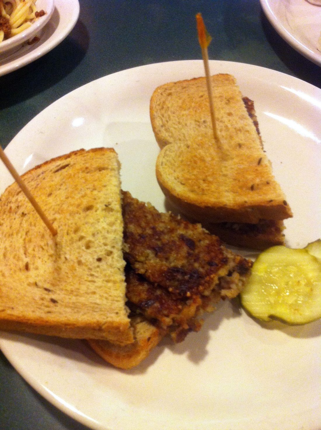 Goetta, pan-fried — Cincinnati's German cousin of scrapple, bound with steel-cut oats instead of cornmeal.