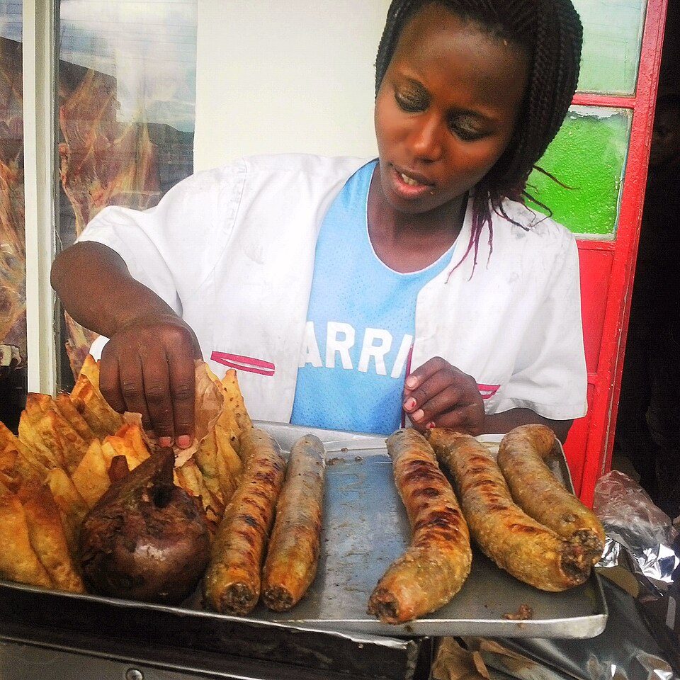 Mutura grilling at a Kenyan stall — a genuine sub-Saharan blood-and-offal sausage.