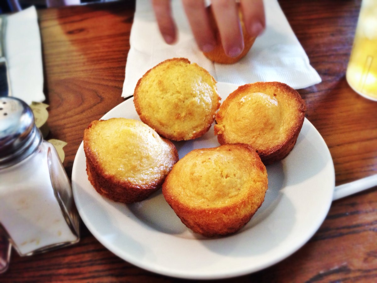 Cornbread served beside a bowl of beans, which is most of what it was actually for