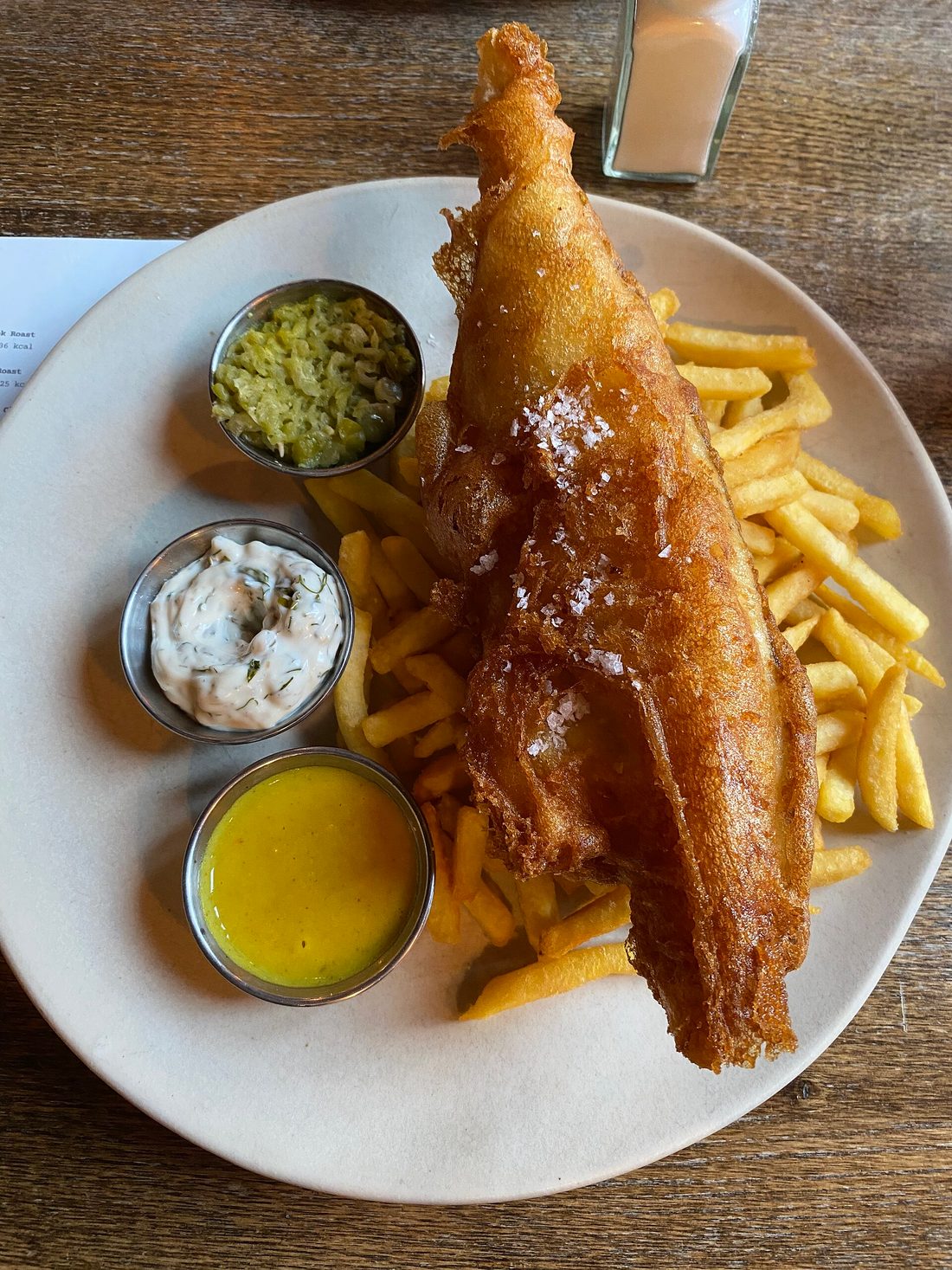 A Friday fish fry plate — battered fried fish with sides at a Northwoods supper club