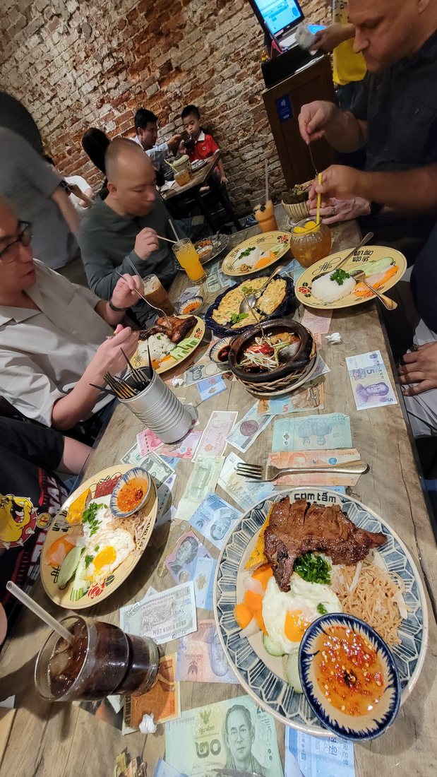 The room, and the placemat menus in use on the table