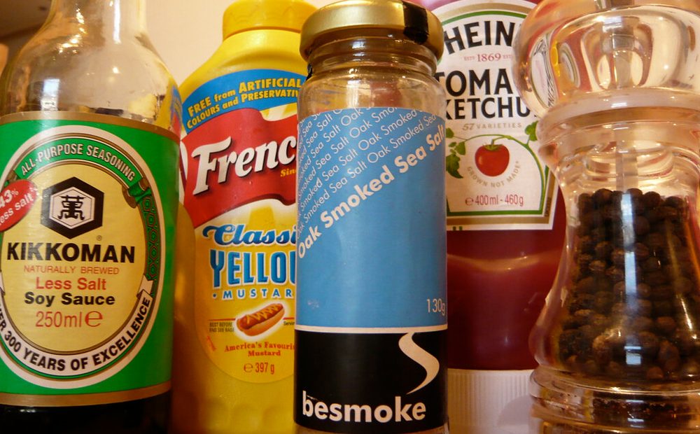 my mise en place for a batch of BBQ sauce, with the Worcestershire bottle front and center among the ketchup, molasses, and vinegar (placeholder)